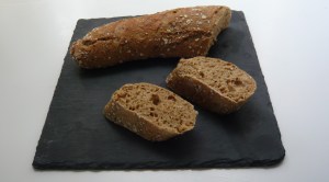 The distinctive holes in the bread are typical for sourdough