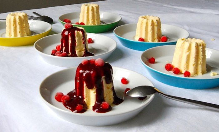 The finished parfaits, decorated with red currants and fruit compote