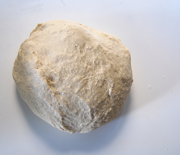 Gradually the dough begins to hold its shape and lets you form it into a ball