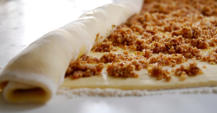 rolling up Chelsea buns