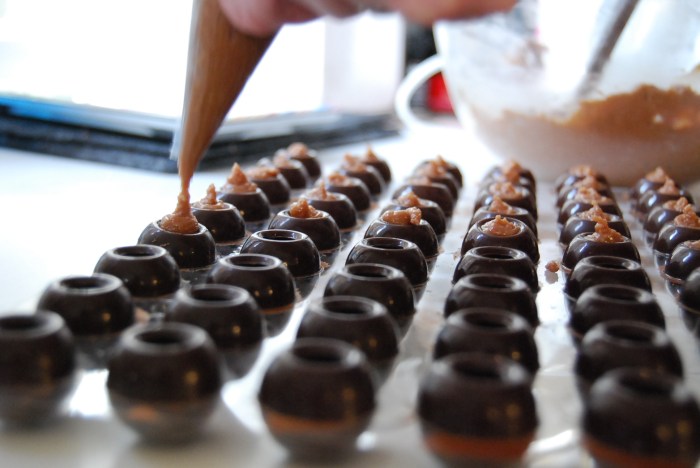 filling gianduja into shells