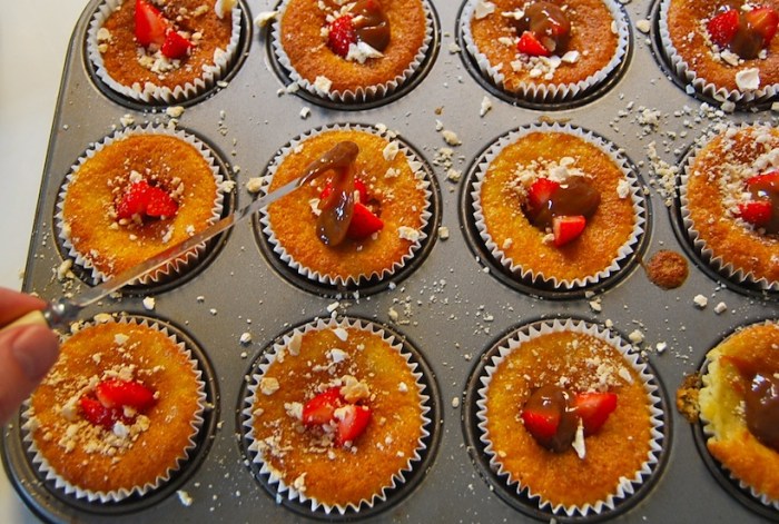 filling cupcakes with fruit
